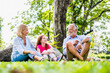 © Png - Video - Photo - Happy family parent and child relax in weekend holiday lifestyle park outdoor nature background.