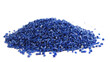 Secondary granule made of polypropylene, Blue Plastic pellets crumbles to the table. Plastic raw materials in granules for industry. Polymer resin. Raw plastic recycling concept