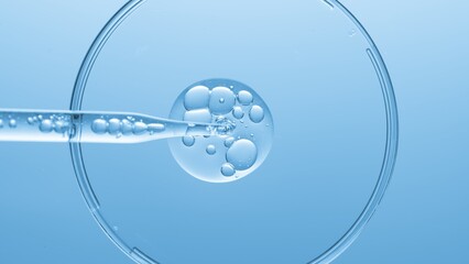 close up view macro shot of gel with different sized bubbles comes out from lab dropper into petri d