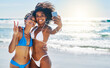 © Delmaine Donson/peopleimages.com - Stay beachy. Shot of two young women taking selfies together at the beach.