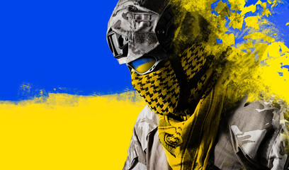 Photo of fully equipped ukrainian military soldier in uniform on national flag background.