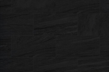 Wall Mural - ิblack travertine marble tile patterned use as background for luxury and elegance concept. dark black marble texture abstract background pattern or marble tile wall.