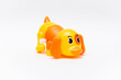 © Дарья Воронцова - Colorful orange yellow plastic dog wind up toy isolated on white background mockup banner with copy space, toys for children, kids development, playing, childhood fun