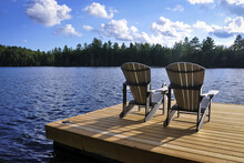 Wooden Chairs On The Lake