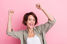 Photo Of Glad Positive Lady Rejoice Fists Up Scream Yeah Win Jackpot Isolated Over Pastel Color Background