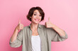 Photo of positive attractive lady show thumb up symbol suggest perfect shopping offer isolated over pastel color background