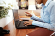 Shopping online saves me so much time. Cropped shot of a businesswoman using a laptop and credit card.