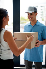 Aufkleber - Handing over a successful delivery. Cropped shot of a courier making a delivery to a businesswoman at her office.