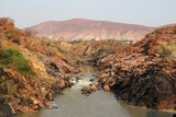 Fototapeta Zwierzęta - river in the desert between Angola to Namibia 