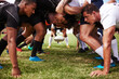 © Chanelle Malambo/peopleimages.com - The battle begins. Shot of a group of young rugby players in a scrum on the field.
