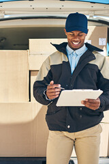 Poster - He always double-checks his deliveries. Shot of a courier checking the deliveries in his van.