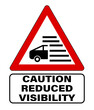 Caution reduced visibility, fog area. Triangle road warning sign.