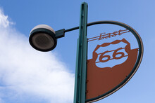 Low Angle View Of Route 66 East Sign On Street Light Post In Albuquerque, New Mexico, USA