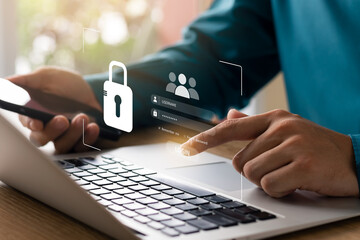 Cybersecurity and privacy concepts to protect data. Lock icon and internet network security technology. Businessmen protecting personal data on laptops and virtual interfaces.