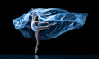 © master1305 - Graceful classic ballerina dancing with weightless fabric isolated on black studio background in neon. Theater, art, beauty, grace, action and motion concept.