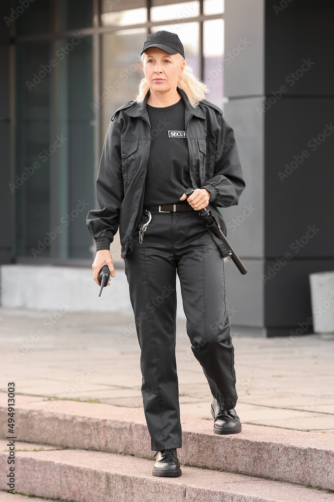 Female security guard outdoors