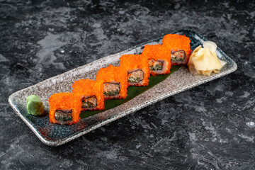 Canvas Print - California sushi roll set with crab, cucumber and tobiko caviar. Japanese dish of crab meat with rice. Top view