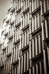 Vertical vintage bnw show of the 2 More London Riverside corner building with beautiful architecture