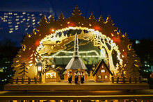 Panoramic Shot Of A Plywood Christmas Scene Under Arc Made By Wood And Lights