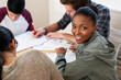 © Marius V/peopleimages.com - I love studying with my friends. Cropped shot of a group of university students in a study group.