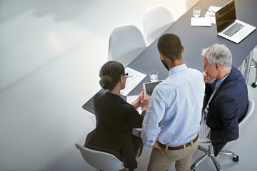 Aufkleber - Meeting in progress. Shot of corporate businesspeople having a meeting in an office.