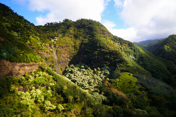 Aerial view of Hanapepe Valley on Kauai island, Hawaii, United States - Multiple waterfalls in a lush tropical landscape