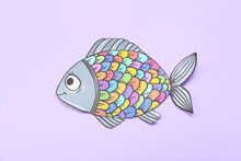Paper Fish On Color Background. April Fools Day Celebration