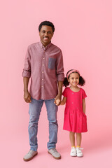 Poster - Portrait of little African-American girl and her father on pink background