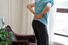 Back Pain, Kidney Inflammation, Man Suffering From Backache At Home