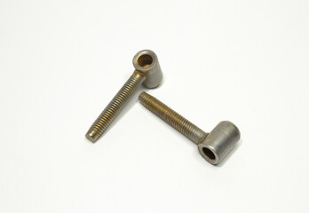 Metal bolts - fasteners on white background