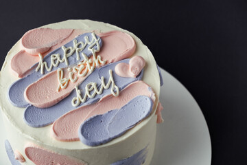 Canvas Print - Bento cake with blue and pink cream cheese frosting and Happy birthday text on top. Birthday cake on a gray background. Asian small cake trend.