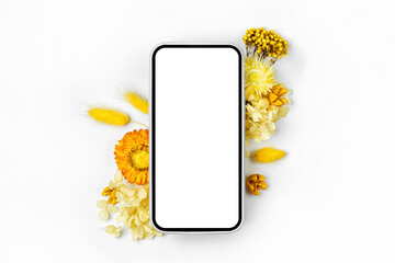 Wall Mural - smartphone mockup with yellow flowers. device screen mockup on stylish background for presentation o