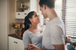 © Allistair F/peopleimages.com - He knows just how to make my heart skip a beat. Cropped shot of a happy young couple slow dancing in their kitchen.