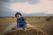 © Lucky Fenix - Family outdoor lifestyle. Freedom concept. Smiling little girl in summer field