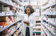 Never fear, your pharmacist is here. Cropped shot of an attractive young female pharmacist working in a pharmacy.