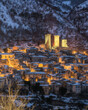 Panoramic view of Pacentro covered in snow at sunset during winter season. Abruzzo, Italy.