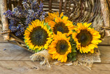 Fototapeta  - sunflowers and lavender in a basket
