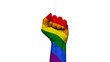 Raised hand clenched into a fist in LGBTQIA+ colors, pround, love and tolerance