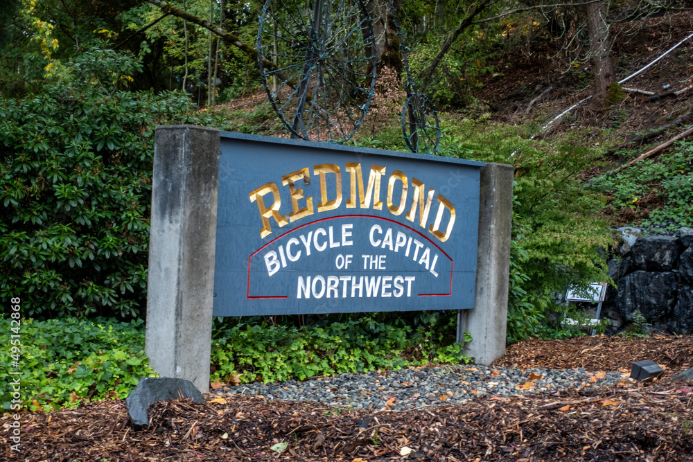 Redmond, WA USA - circa August 2021: Angled view of the Redmond Bicycle Capital of the Northwest sign near Lake Sammamish.