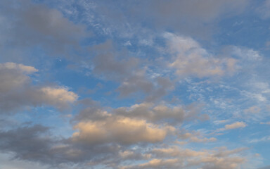 Wall Mural - blue sky with patchy clouds.