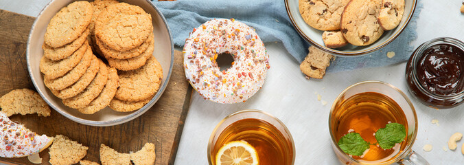 Wall Mural - Delicious oat cookies on light background.