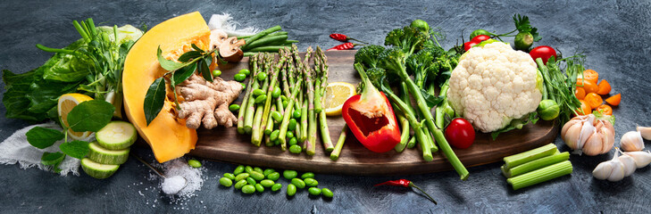 Wall Mural - Delicious raw fruits and vegetables on  background.