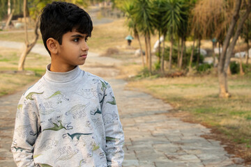 A young Pakistani boy in park