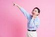 © Timeimage - Image of young beautiful Asian girl posing on pink background