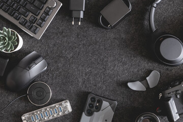 top view of home desk table with keyboard, mouse and accessory on table.