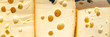 © Alesia Berlezova - cheese with holes hard grade aged cheese cheesy fresh portion healthy meal food diet snack on the table copy space food background rustic top view