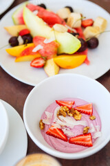 Wall Mural - Breakfast with fresh fruits and yoghurt