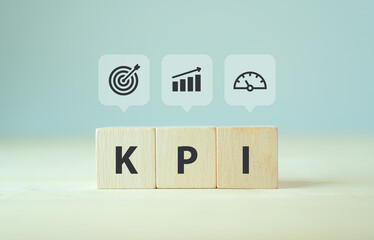 Wall Mural - Banner KPI concept. Key Performance Indicator using business intelligence metrics to measure achievement versus planned target.  Wooden cubes with 