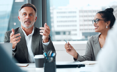 Fototapete - It takes a simple idea to spark something big. Shot of a group of businesspeople having a meeting in an office.