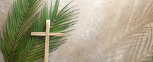 Palm Cross And Palm Leaves. Palm Sunday And Easter Day Concept.
